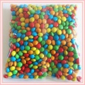 sugar coated hard dragees m&m candy like chocolate beans - product's photo