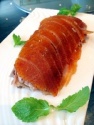 frozen cooking skin-on roasted duck - product's photo