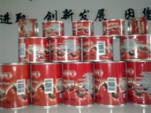 tomato paste in cans - product's photo