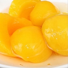 canned yellow peach havles in light syrup - product's photo