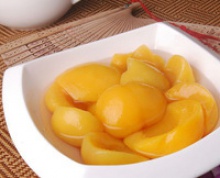 canned yellow peach in halves and strips - product's photo