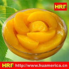canned yellow peach slices - product's photo