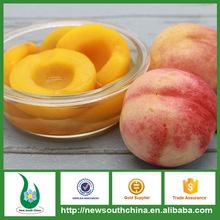 canned yellow peach half in syrup - product's photo