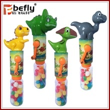 summer manual plastic dinosaur shape water gun candy toy - product's photo
