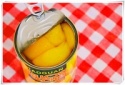 canned yellow peach in syrup - product's photo